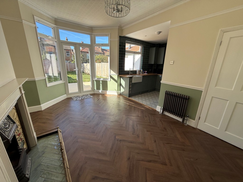 Lot: 132 - THREE-BEDROOM TERRACE HOUSE - Dining area opening to kitchen